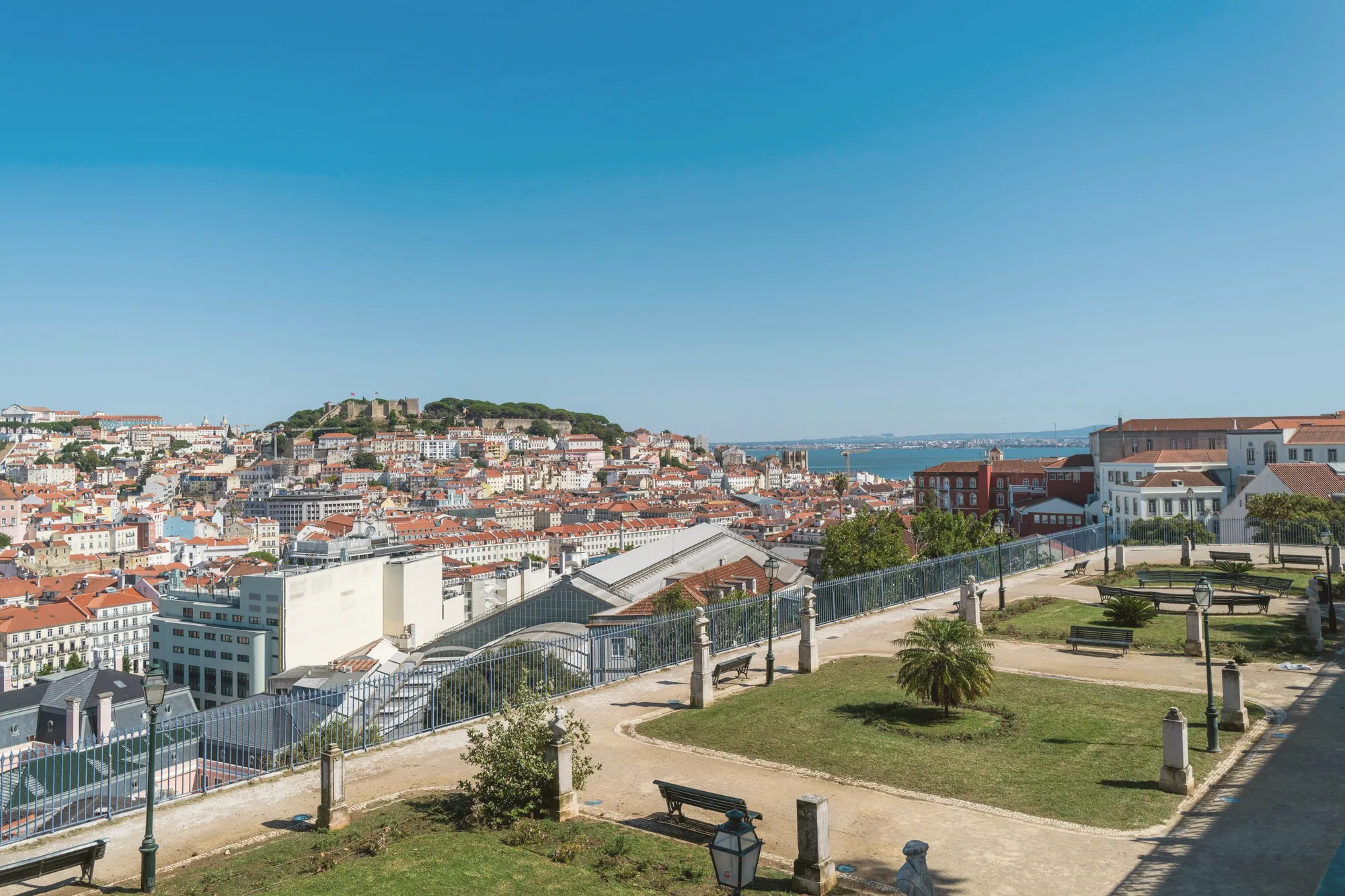Morning light on the rooftops and the castle from the miradouro
